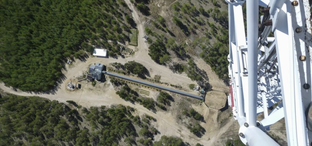 ZOTTO tower view from above, in front white scaffold