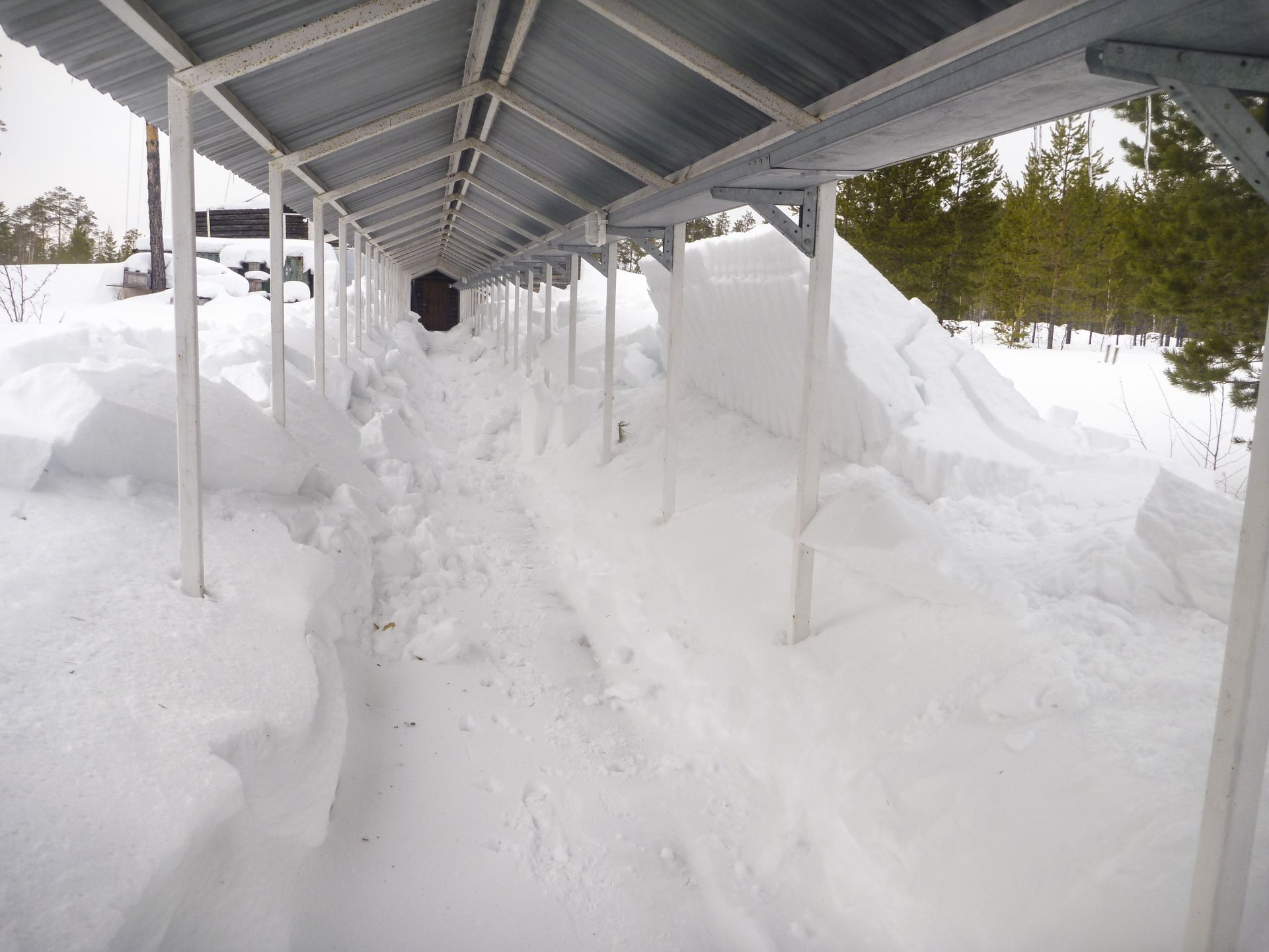 connecting corridor in zotto with lots of snow