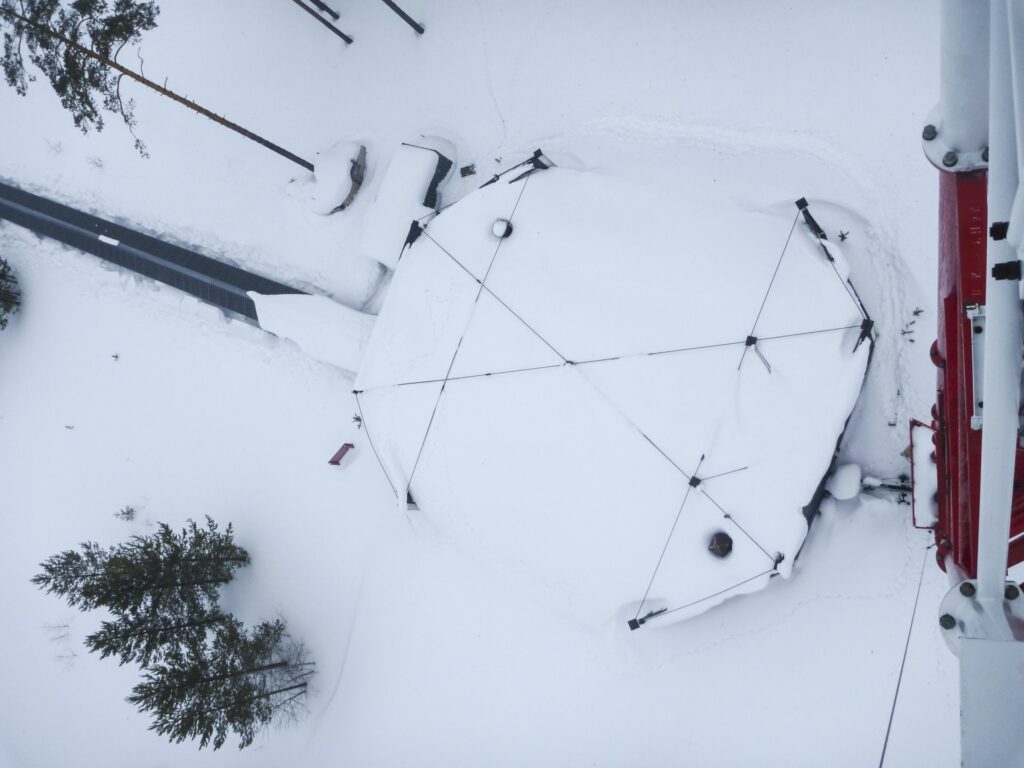 snow-covered bunker roof from above