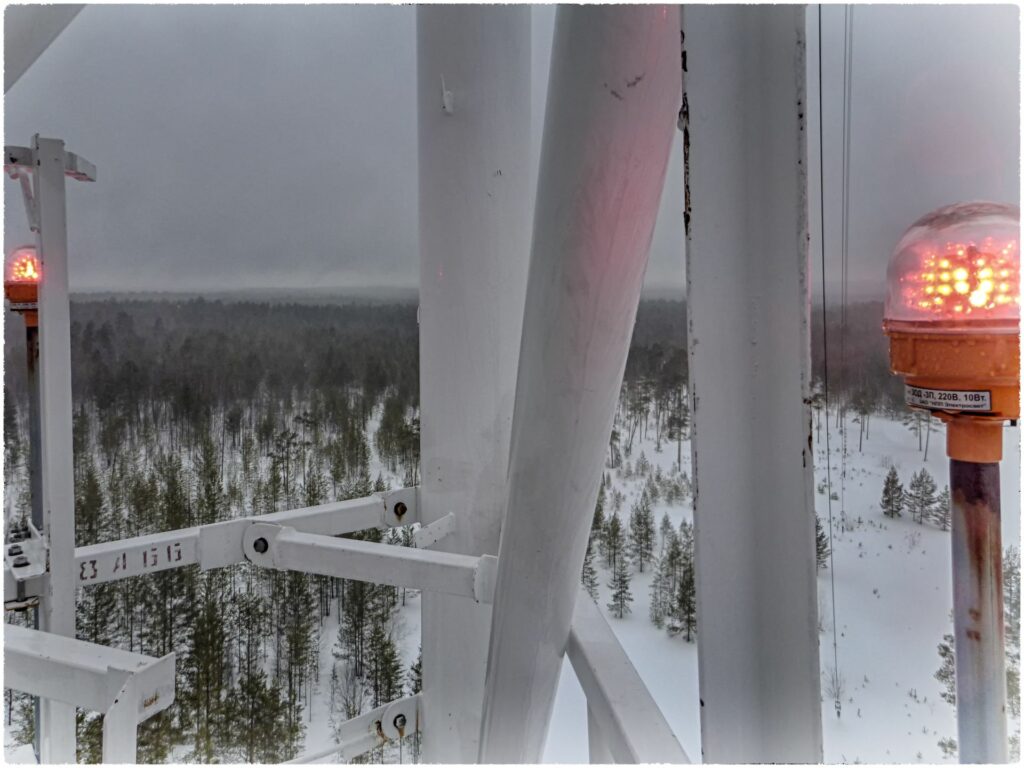 view from the tower in cold and wet winter weather and red signal lamp