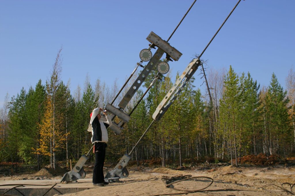 measuring the accuracy of the bracing angle on the tower