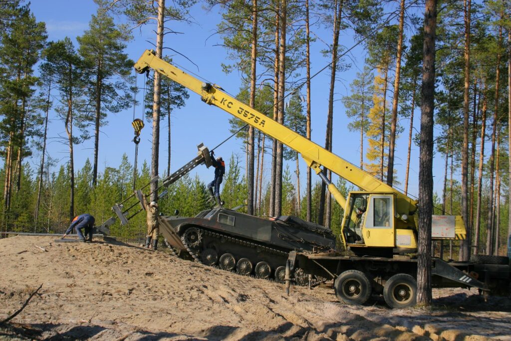 excavator and armour while fixing the bracing